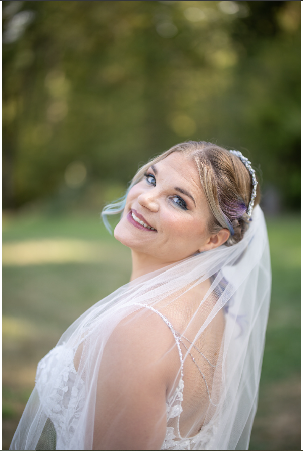 Bride in a veil at a Pacific Northwest garden wedding, soft glam bridal makeup by Eleglam